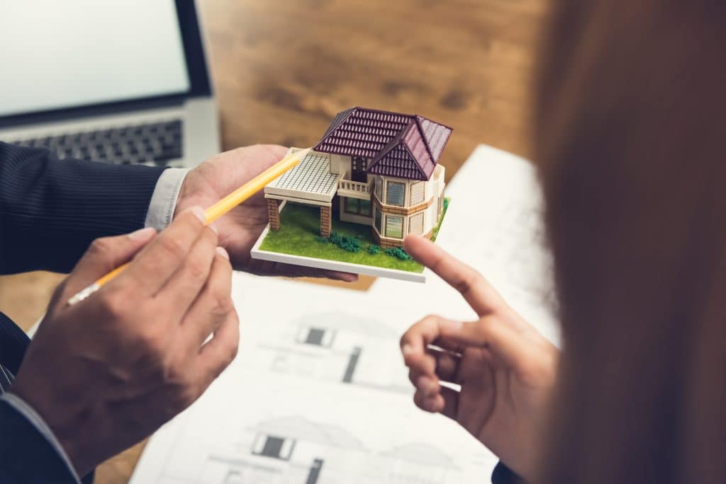 housing developer demonstrating real estate value